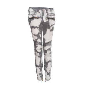 Balmain Gray biker jeans with bleach stains.